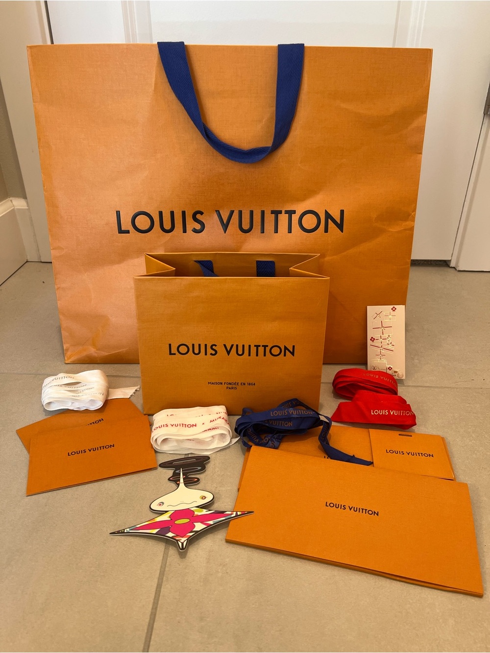 Louis Vuitton packaging bundle bags ribbon